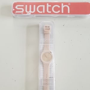 Ladies pink Swatch watch